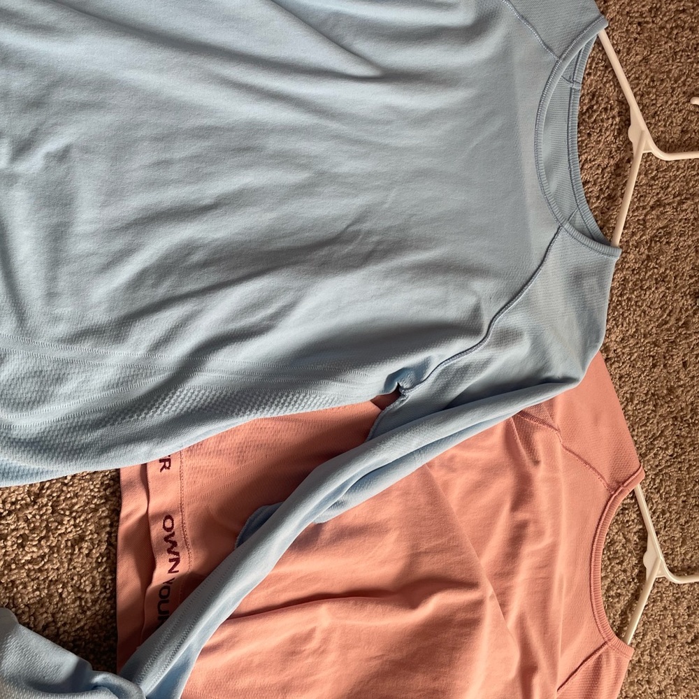 Blue and pink athleta shirts